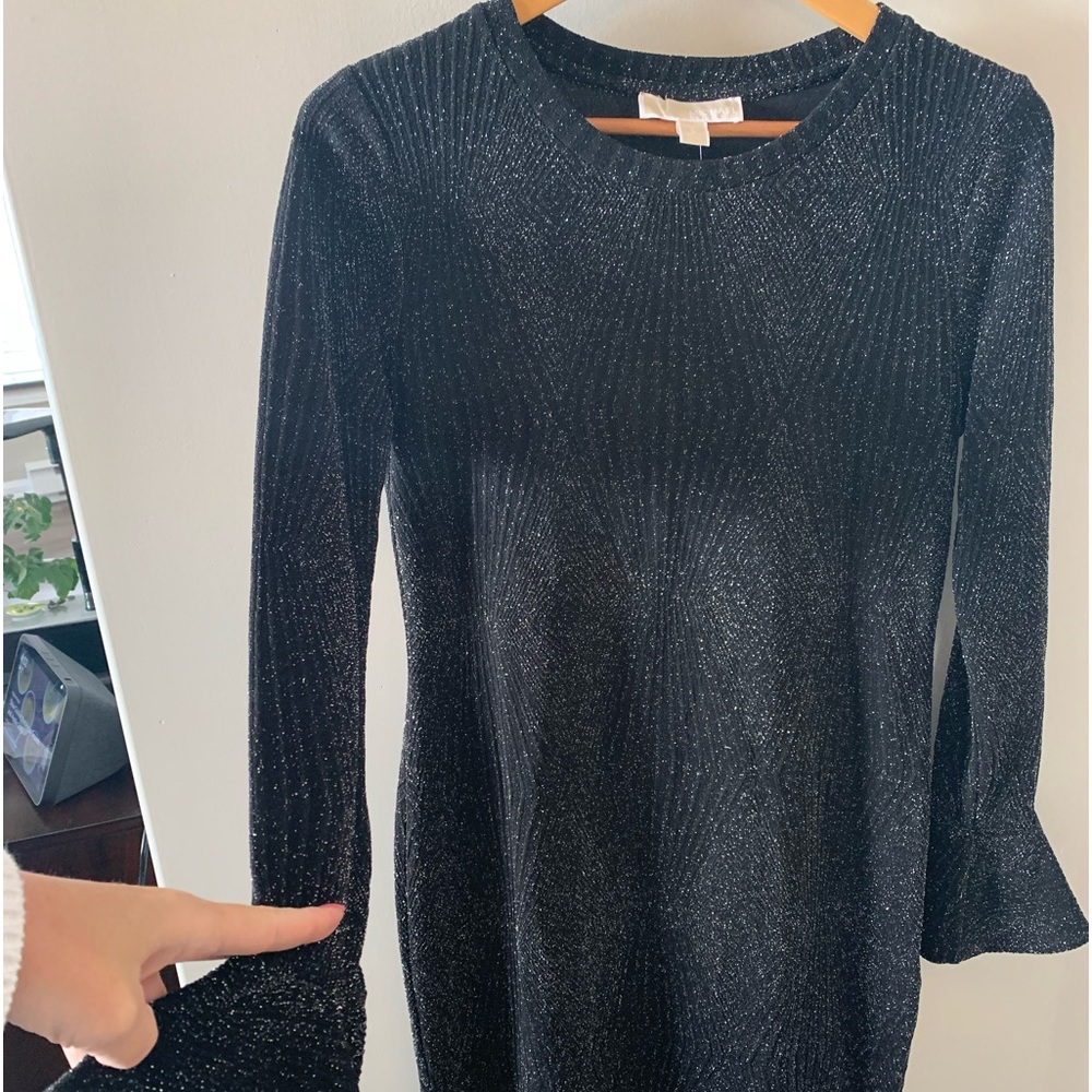 Size large Michael Kors Shimmery dress fits more like a med.
